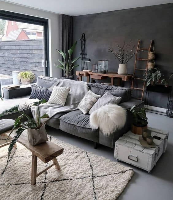 Charcoal Elegance: Crafting a Dark and Moody Living Room Atmosphere